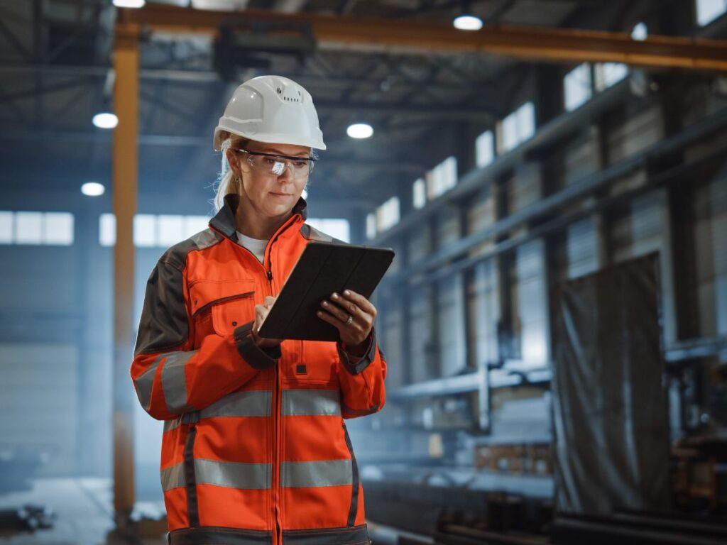 A construction employee utilizes construction software integration services