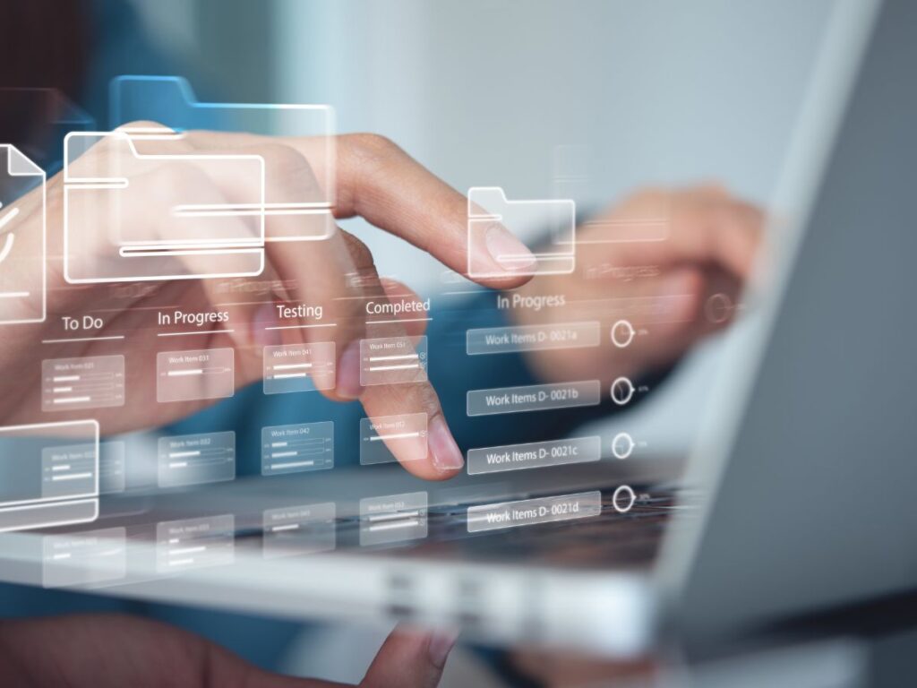 A person manages technology for project management