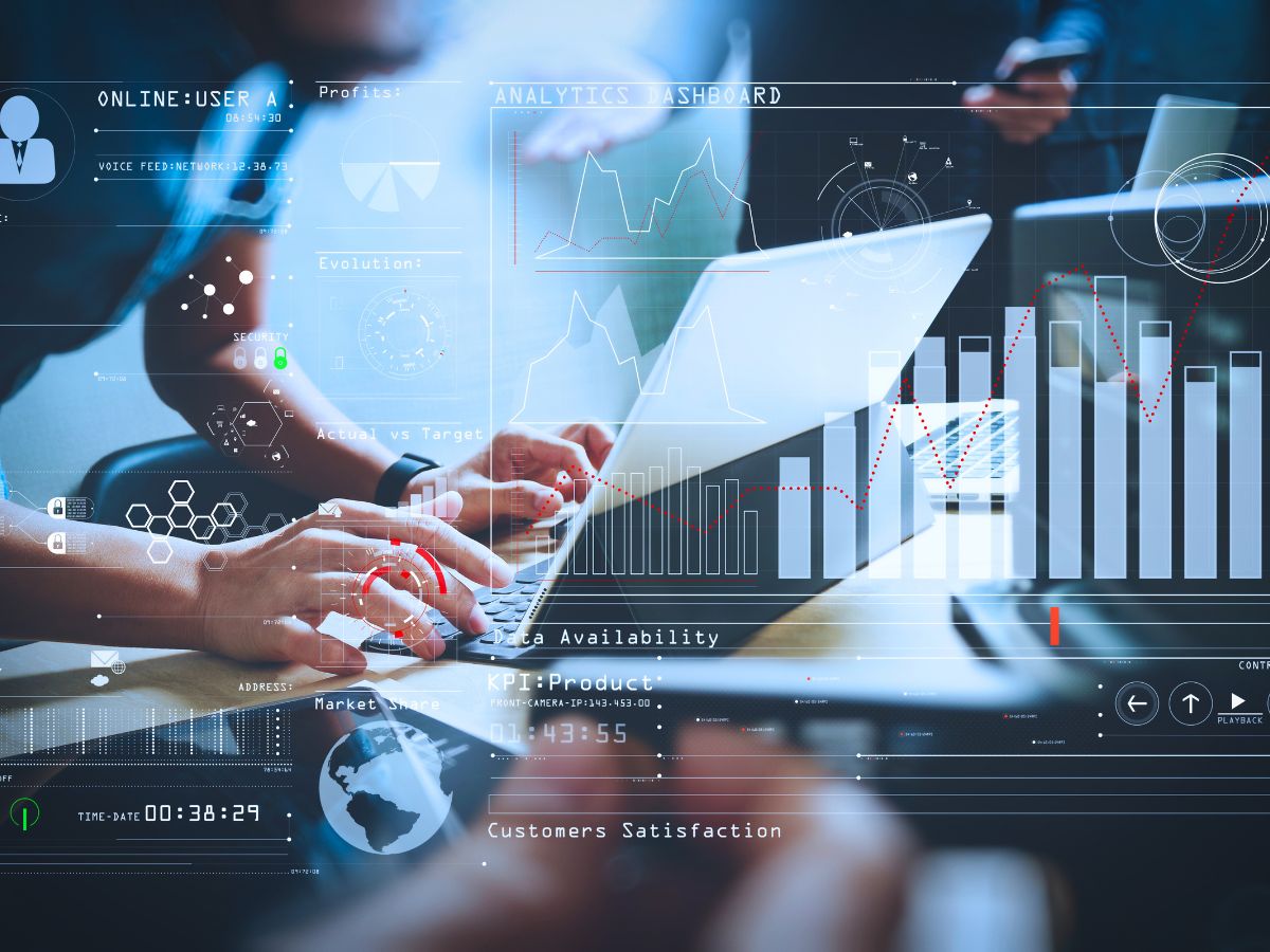 A digital bar graph is superimposed over an image of someone typing on a laptop. This represents submittal management in Procore.